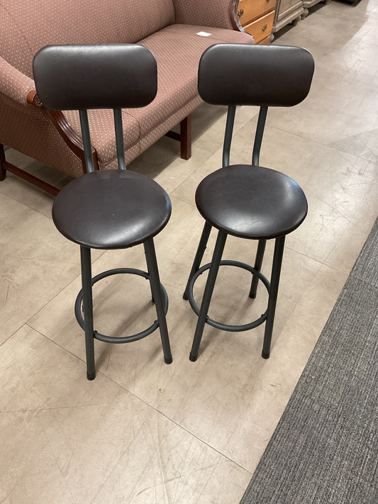 Pair of dark bar stools with backs